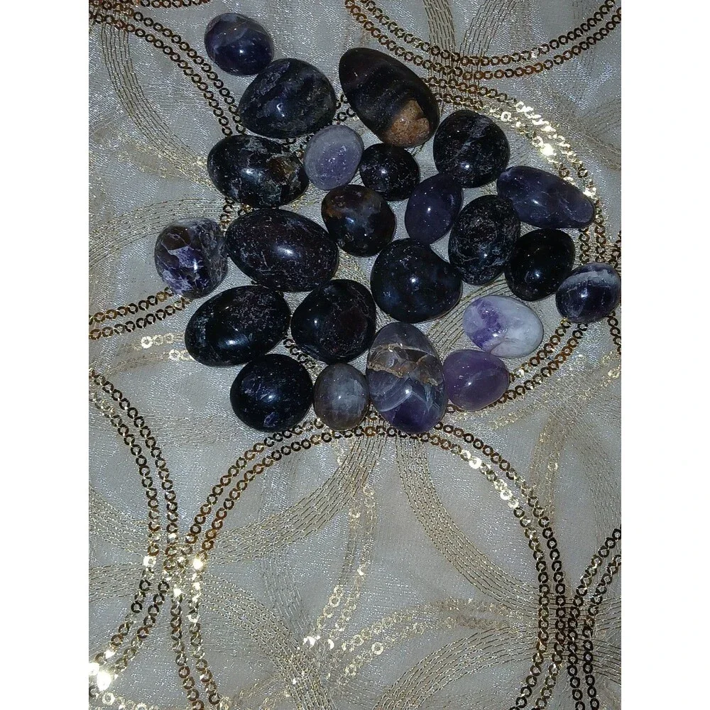 Assorted Polished Amethyst and Garnet in Astrophyllite Tumbled Stones